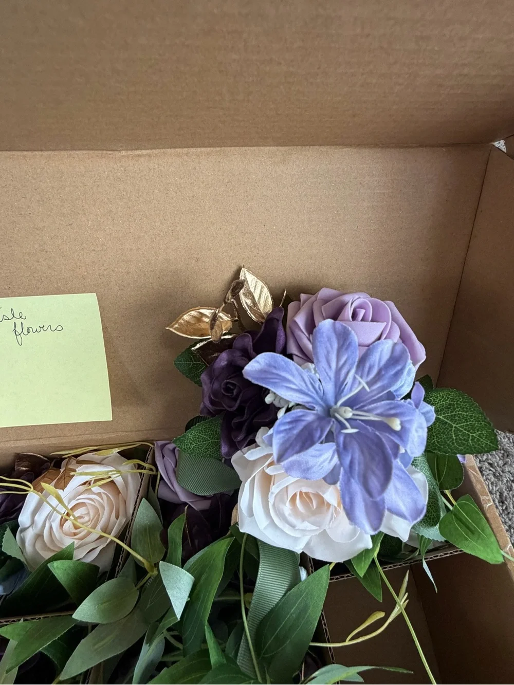 Ling’s Moment lilac & gold aisle floral arrangements